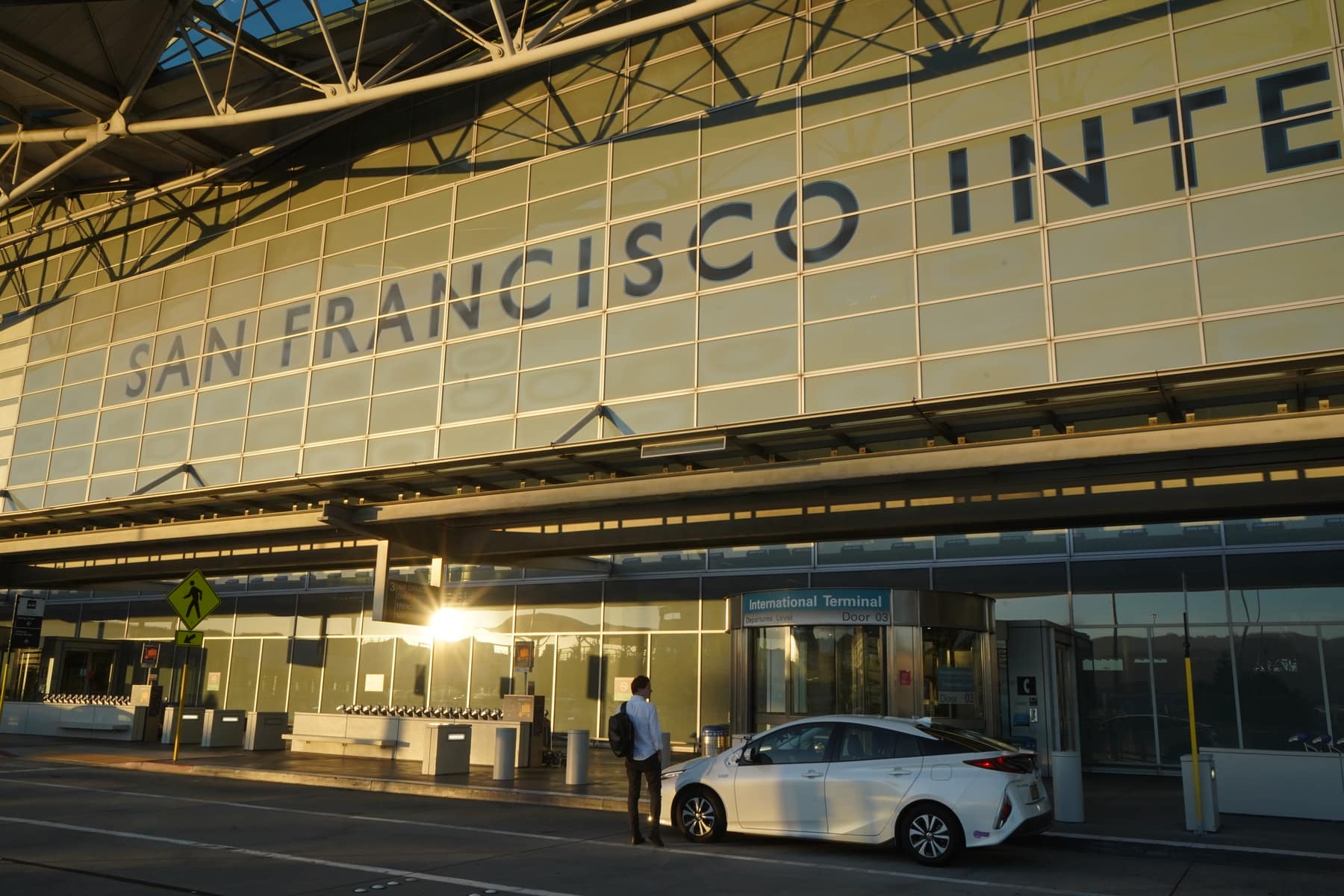 A Qibus-equipped vehicle at San Francisco International Airport at sunrise, ready for delivery